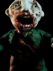 A gruesome fight between a man and a zombie.